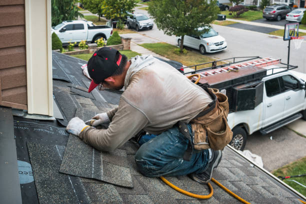 Professional Roofing technician working in Baldwin, MI
